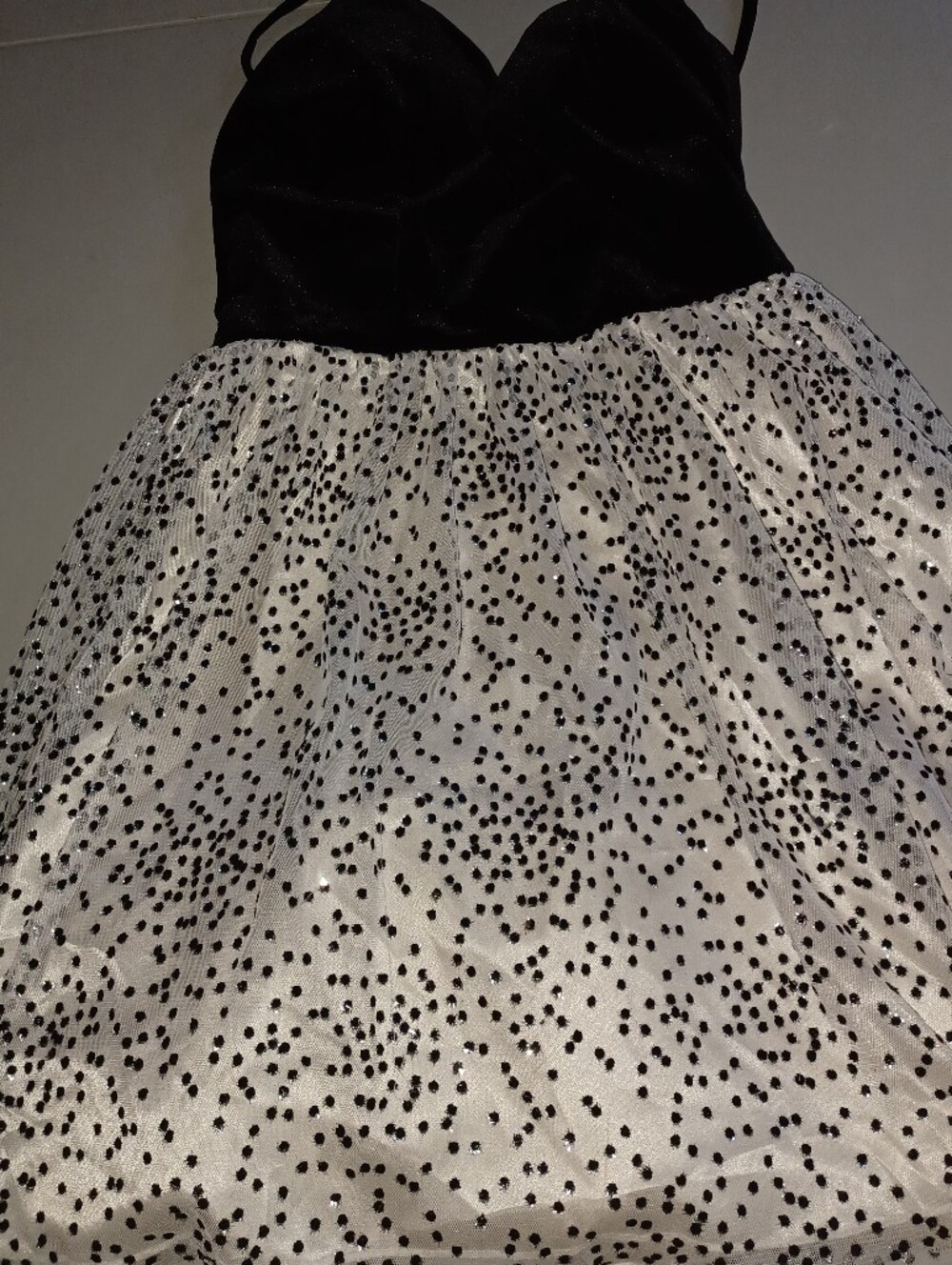 Teeze Me Black Garment with Red Heart Logo Accent